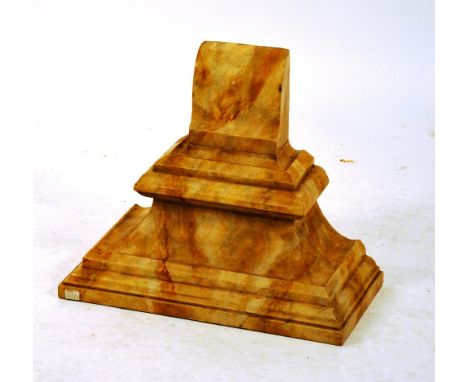A faux marble wall bracket, of ogee form, 39cm high x 48cm wide x 25cm deep
