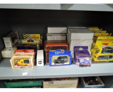 A shelf of modern diecasts including Shell, Days Gone, Matchbox etc, all boxed