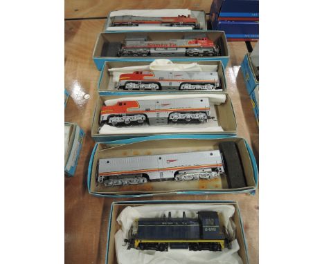 Five Athearn HO scale American brass Santa Fe locomotives, 2418, 690, 104, 69 &amp; 74, one with a tender,  all boxed