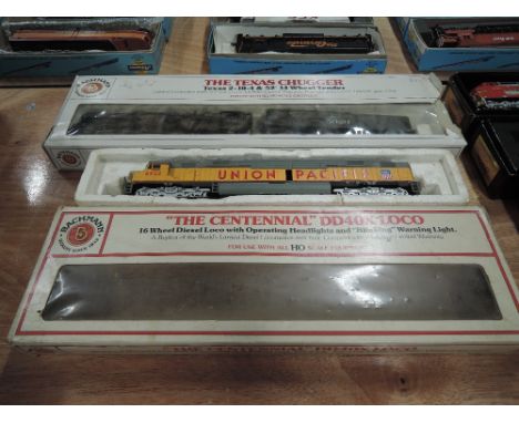 Two Bachmann HO scale American brass, The Texas Chugger, 2-10-4 Santa fe and The Centennial Union Pacific, both boxed