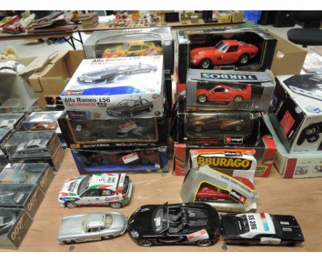A collection of 1:18 &amp; 1:24 scale Burago, Maisto and similar diecasts including Ferrari's, Chevrolet's Rally cars etc, mo