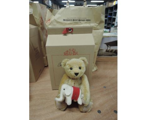 A modern limited edition Steiff bear, Teddy's Elephant, having gold button and white tag 661358, with certificate in box with