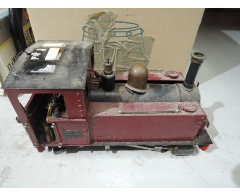 A Roundhouse G gauge 0-4-0 live steam and radio controlled tank engine, another similar part built engine along with a small 