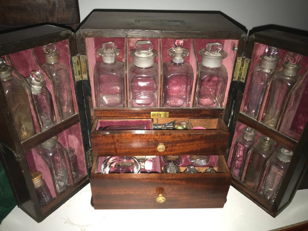 A Victorian mahogany domestic medicine chest, flush handle above two