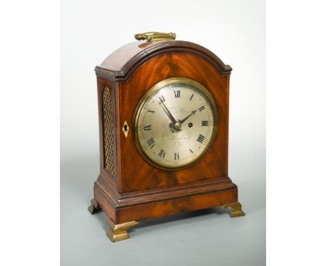 A small late George III mahogany bracket clock, circa 1800, the breakarch case with folding handle above 5inch (13cm) circula