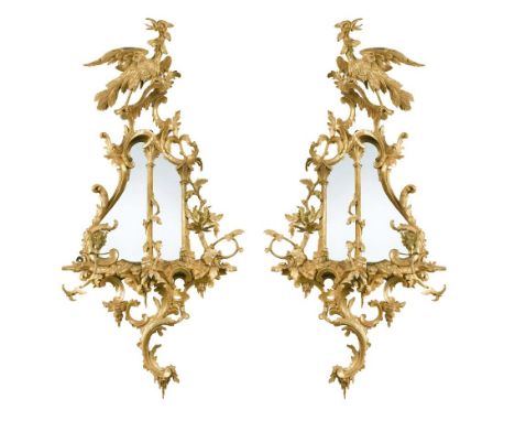 A pair of 18th century Chippendale style carved giltwood girandoles, with ho-ho bird crest and rococo flourishes (2) 92cm (36