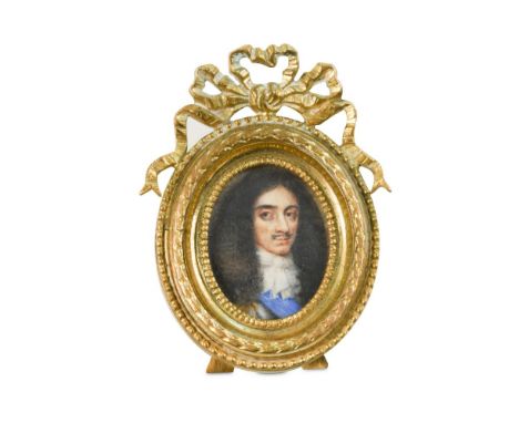 Follower of Peter Oliver, 17th Century  Portrait miniature of King Charles II watercolour on card, oval, in a later gilded fr