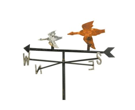 A Folk-art painted iron weather vane, with two flying geese to the pointer  