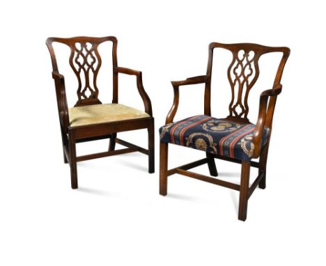 Two similar George III mahogany elbow dining chairs, in the manner of Chippendale (2) 95 x 65cm (37 x 25in)  