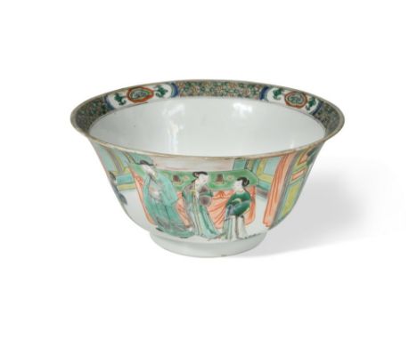 A Chinese famille verte bowl, Kangxi (1662-1722), of circular ogee shape, enamelled with a continuos frieze depicting musicia