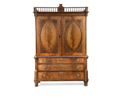 A late 19th century Dutch Neo-Classical mahogany armoire, circa 1800, the gallery top above a pair of oval panel doors and th