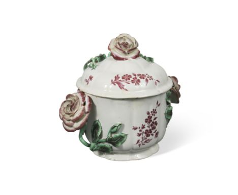 A Strasbourg faience two-handled bowl and cover, circa 1770, with foliate handles and finial, 13cm high (2) Provenance: Mawle