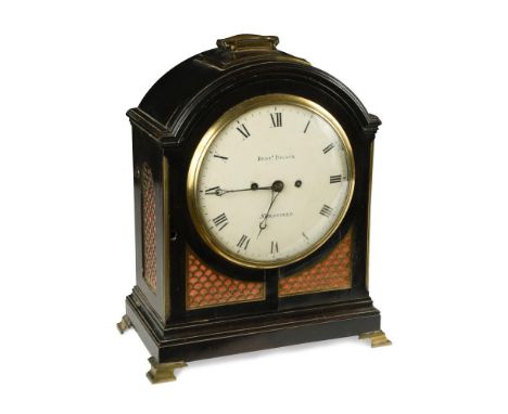 A Regency ebonised bracket clock, the single pad top case with carrying handle above 8inch (20cm) painted dial signed 'Benjn.