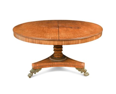 A Regency mahogany centre table, in the manner of Gillow, the circular crossbanded top, on turned column and tripod base with