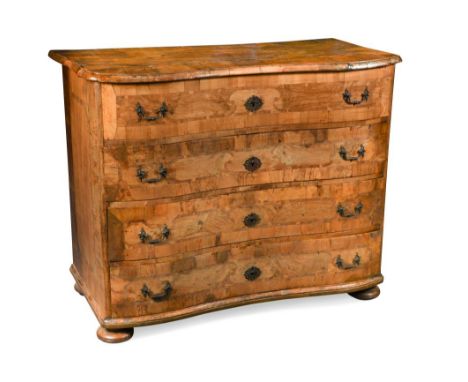 An 18th century olive wood Maltese commode, of en arbalete outline, on four squat bun feet 101 x 122 x 59cm (39 x 48 x 23in) 