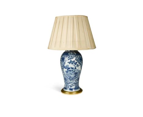 A 19th century Chinese blue &amp; white vase and cover, now as a table lamp, painted with scenes of Oriental figures beneath 