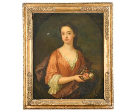 English School, circa 1720   Portrait of a young lady, half-length, in an orange dress with a brown wrap, holding a posy, in 