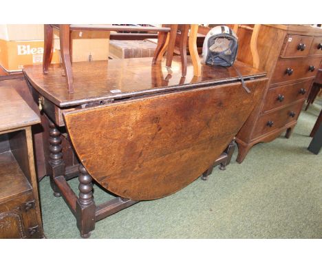 Georgian Oak Gateleg table with bobbin turned legs 