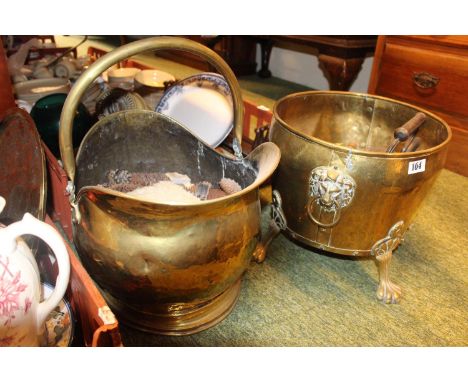 Good quality Brass Log bucket on paw feet with assorted bygones and a coal Helmet 