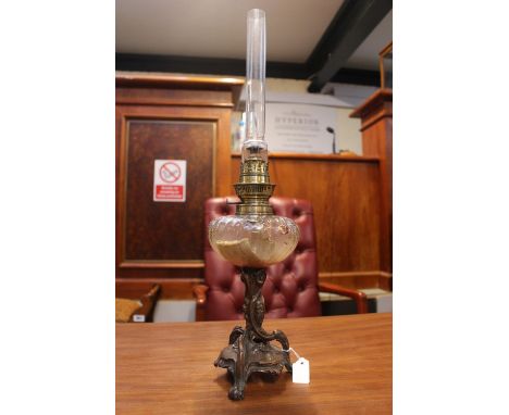 Art Nouveau Oil lamp with clear glass reservoir and narrow chimney 