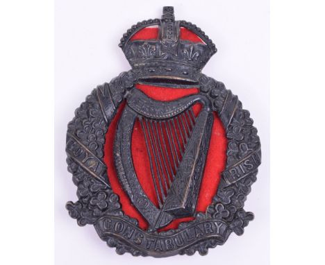 Royal Irish Constabulary Helmet Plate 1902-1922, die-stamped blackened brass helmet plate of crowned harp within a wreath of 