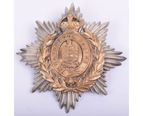 Blackpool Police Helmet Plate, white metal eight pointed star with brass centre having town coat of arms to the centre. Kings