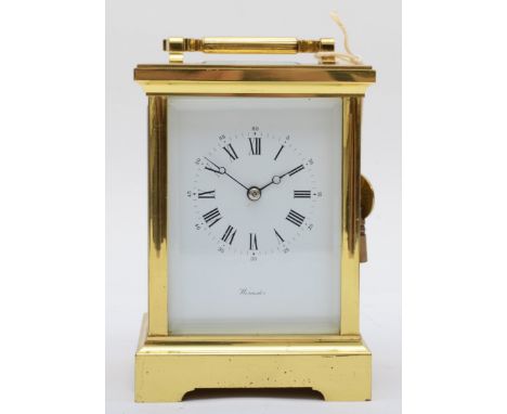 Worcester, a contemporary heavy brass and four glass corniche cased carriage clock, with swing carrying handle, the white dia