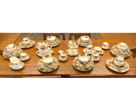 An extensive Royal Albert Old Country Roses extensive dinner service comprising of sixteen  dinner plates, ten large bowls, t