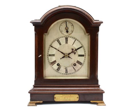 A 20th century Georgian style mahogany cased 8 day mantle clock, the brushed silvered dial with black Roman numerals and subs