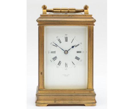 Henry Capt of Geneve, a 20th century brass corniche cased and four glass striking carriage clock, with swing handle, the dial