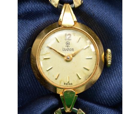 Tudor, A 18k gold cased manual wind ladies wristwatch, the signed champagne dial with baton and Arabic numerals, case numbere