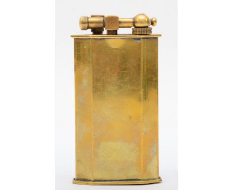 An Art Deco Polaire of Paris brass elongated octagonal table lighter, impressed marks to base, 10cm high.