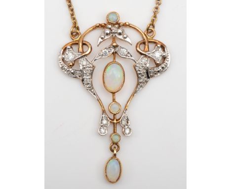 A 10k gold opal and brilliant cut diamond open work pendant, 37mm, on chain 4.9gm. In very good condition - showing no issues