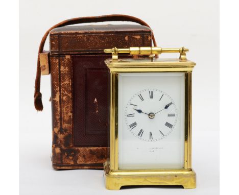 A 20th century French brass and glass corniche cased repeat striking carriage clock, the white dial with black Roman numerals