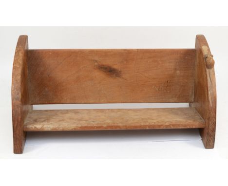 Robert 'Mouseman' Thompson of Kilburn, a mid 20th century slightly adzed oak book trough with carved mouse facing upwards on 