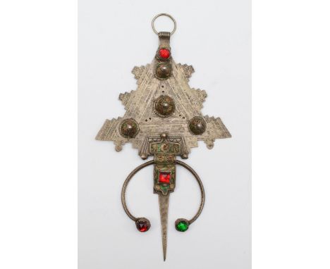 A 19th century Moroccan silver and enamel Amazigh fibula, set with red and green paste stones, 23.5 x 13cm, 139gm. 