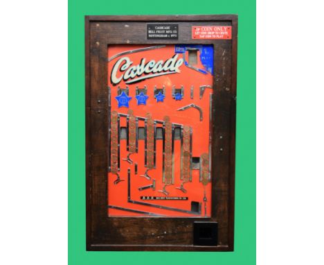 A Cascade wall mounted Allwin, by Bell Fruit Manufacturing Co., c.1970, penny drop case slot machine, stained wood cabinet, 4