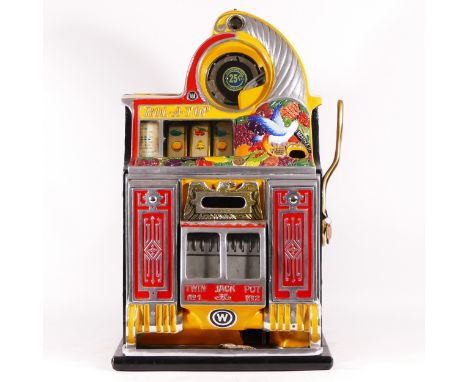 A Watling Rol-A-Top Birds Of Paradise slot machine, one arm bandit, c.1934, restored and working on an American 25 cent coin,