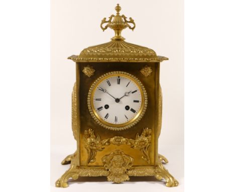 E. Vittoz & Co Paris, a late 19th century French gilt brass mantle clock, with cast urn final and applied decoration raised o