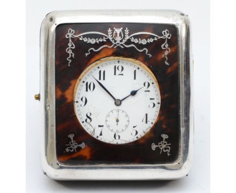 A silver and tortoiseshell boudoir easel clock, London 1918, opening to reveal a nickel plated Goliath watch, tortoiseshell c