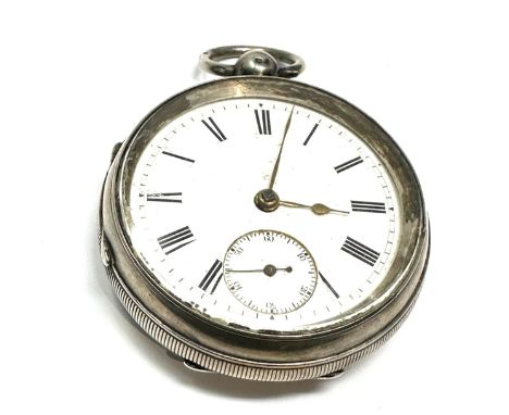 Antique silver open face pocket watch  the watch is not ticking balance is spinning 