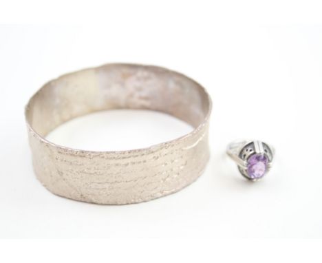 A silver modernist textured bangle and a mid century ring (62g) 