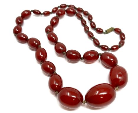 Antique / vintage cherry bakelite graduated bead necklace largest bead measures approx 30mm by 21mm weight 60g 