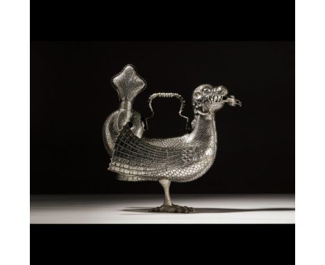 Aquamanile (Caquesseitão)SilverZoomorphic sculpture of fish scales decorationRemovable wings and coiled tale finialOne handle