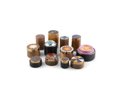 A GROUP OF TWELVE KARL SCHIBENSKY CIRCULAR ENAMEL TOPPED WOODEN BOXES, various designs and sizes. From 4.2cm high to 12.8cm; 