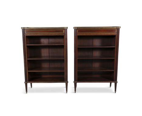 A PAIR OF FRENCH MAHOGANY AND BRASS MOUNTED OPEN BOOKCASES, 19TH CENTURY each of rectangular form, with brass gallery top abo