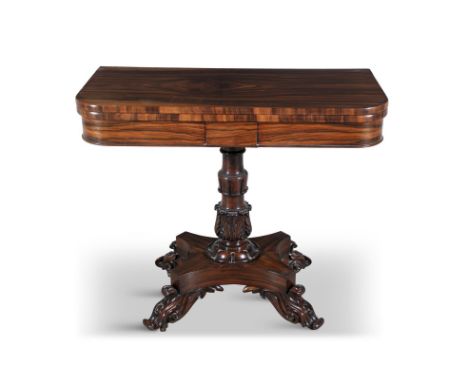 A GEORGE IV ROSEWOOD FOLDING TOP TEA TABLE the rectangular top with rounded corners, raised on a carved centre pillar and qua