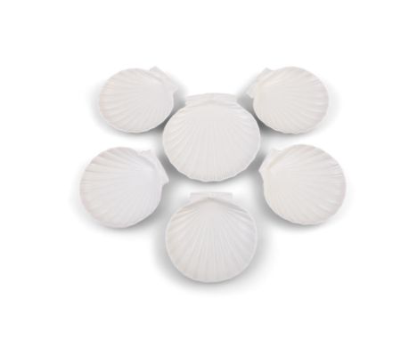 A SET OF FIVE FIRST PERIOD BELLEEK SIDE PLATES,the shell plates with pink tinted rim and impressed marks, together with a mat
