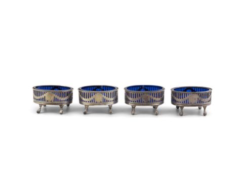 A SET OF FOUR GEORGE III IRISH SILVER SALT CELLARS, Dublin 1782, mark of James Keating, of oval form with pierced sides and c