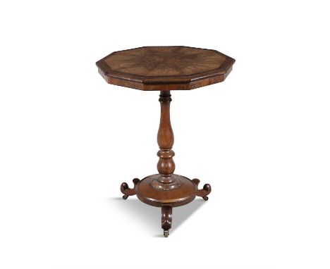 A VICTORIAN OAK AND YEWWOOD BANDED OCTAGONAL OCCASIONAL TABLE the shaped top with radiating veneer on a turned centre pillar 